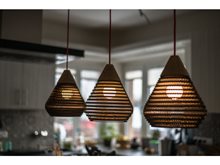 Kartoons Studio - Cardboard furniture, lightings and package design